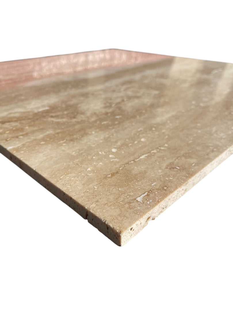 Close-up of Tuscany Vein Cut polished tile showing horizontal veining and gloss