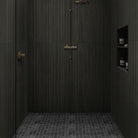 Urbanslat Carbon Wall Panels installed on a bathroom wall with seamless fluted design