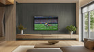 Urbanslat Carbon Wall Panels installed on a living room wall with seamless fluted design