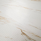 Close-up of Urbanslat Marmi Gold showing 3D fluted texture and soft satin finish
