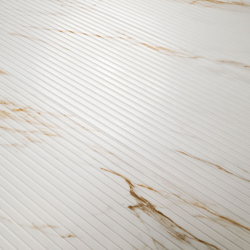 Close-up of Urbanslat Marmi Gold showing 3D fluted texture and soft satin finish