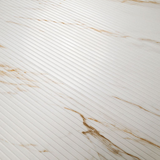 Close-up of Urbanslat Marmi Gold showing 3D fluted texture and soft satin finish