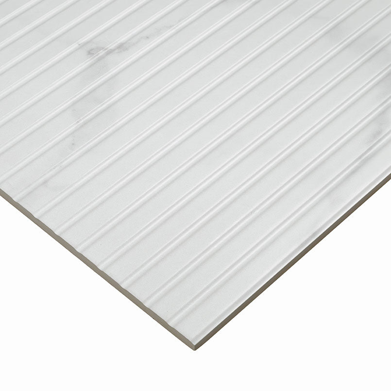 Edge of Urbanslat Marmi Grey showing 3D fluted texture and satin finish