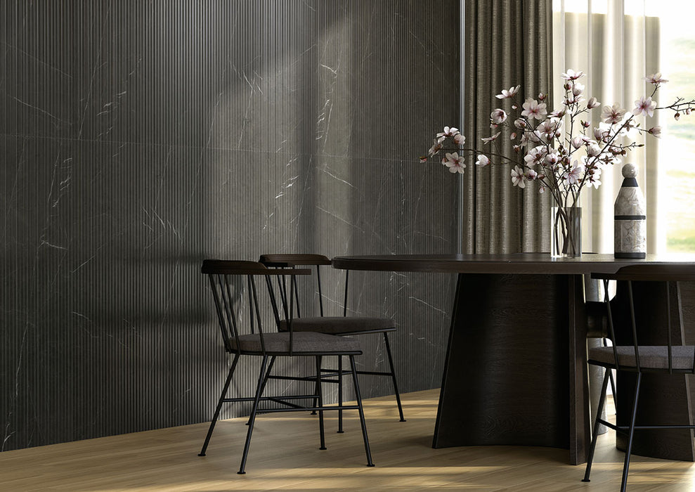 Urbanslat Marmi Noir Wall Panels installed on living room wall with sleek, seamless vertical layout