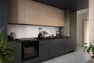 Urbanslat White Wood Look Wall Panels installed in kitchen backsplash surround with seamless vertical layout