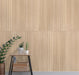 Urbanslat Natural Wood Look 16x48 panels installed on a decorative wall with seamless grout lines