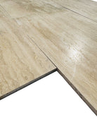 Close-up of Vera Cruz 12x24 polished tile showing vein cut pattern and gloss