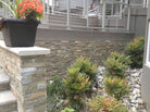 XL Rockmount Golden Honey Corners installed on an outdoor wall with seamless wrap-around finish