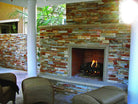 XL Rockmount Golden White Corners installed on fireplace wall with seamless, polished finish