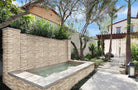 XL Rockmount Roman Beige Corners installed on exterior wall for a seamless, polished finish