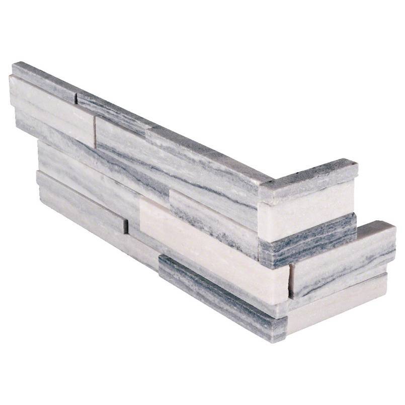 Overhead view of Alaska Gray 3D Honed marble corner panels in clean white and gray tones