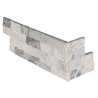 Top view of Alaska Gray split face marble corner panels showing natural veining