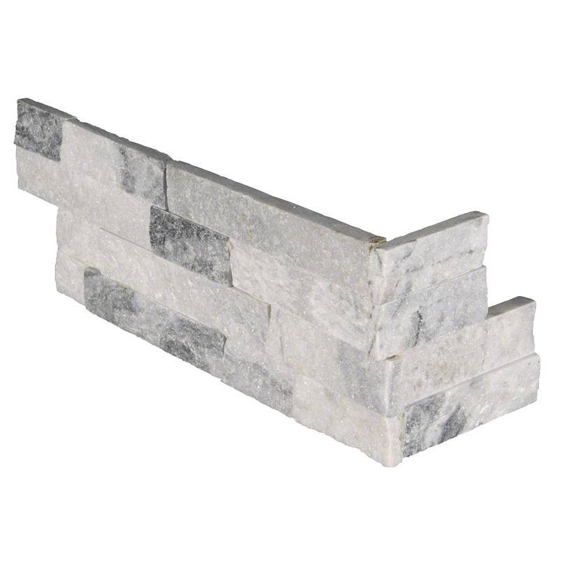 Top view of Alaska Gray split face marble corner panels showing natural veining