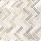 Flat lay of Angora Marble Herringbone mosaic showing beige and taupe tones