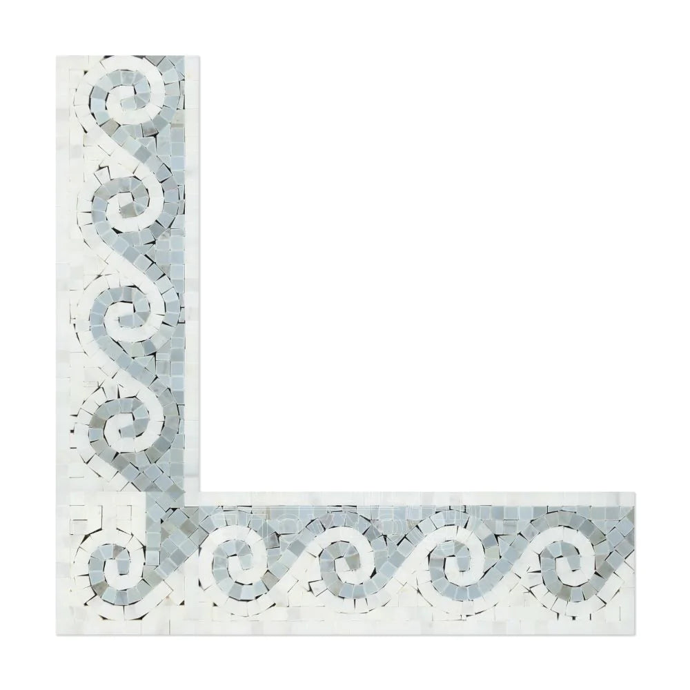 Close-up of blue Greek wave motif on Carrara marble border 4x12