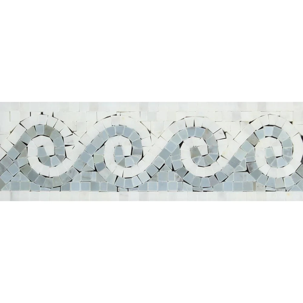 Close-up of blue Greek wave motif on Carrara marble border 4x12