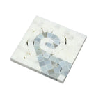 Close-up of 4x4 Carrara Greek Wave Corner in blue detail