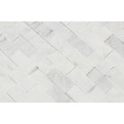 Close-up of Arabescato Carrara Splitface Mosaic showing white and gray textured surface