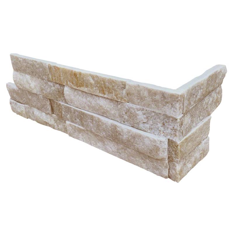 Flat lay of Arctic Golden split face corner panels showcasing white and cream quartzite
