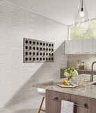 Close-up of smooth honed texture on Arctic White 3D marble panel