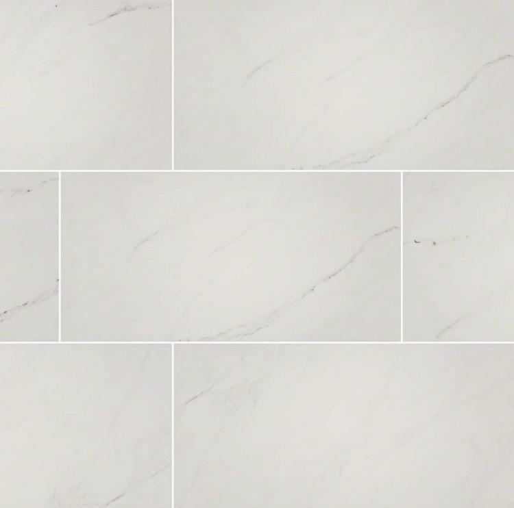 Flat lay of Aria Ice porcelain tile in polished finish with soft cream tones