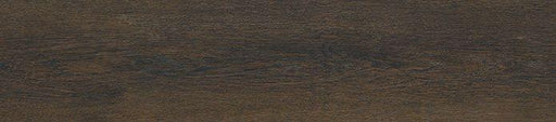 Close-up of Barrel LVT showing realistic walnut-style wood knots and matte texture