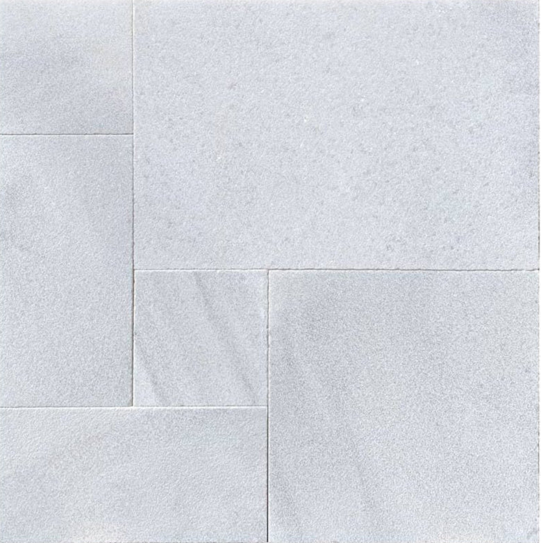 Bianco Carrara Marble pavers in Versailles pattern with leathered finish
