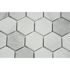 Close-up of Bianco Mare marble showing 2x2 hexagon pattern and natural veining