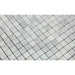 Close-up of Bianco Mare Marble Mosaic showing small 5/8 squares and gray veining