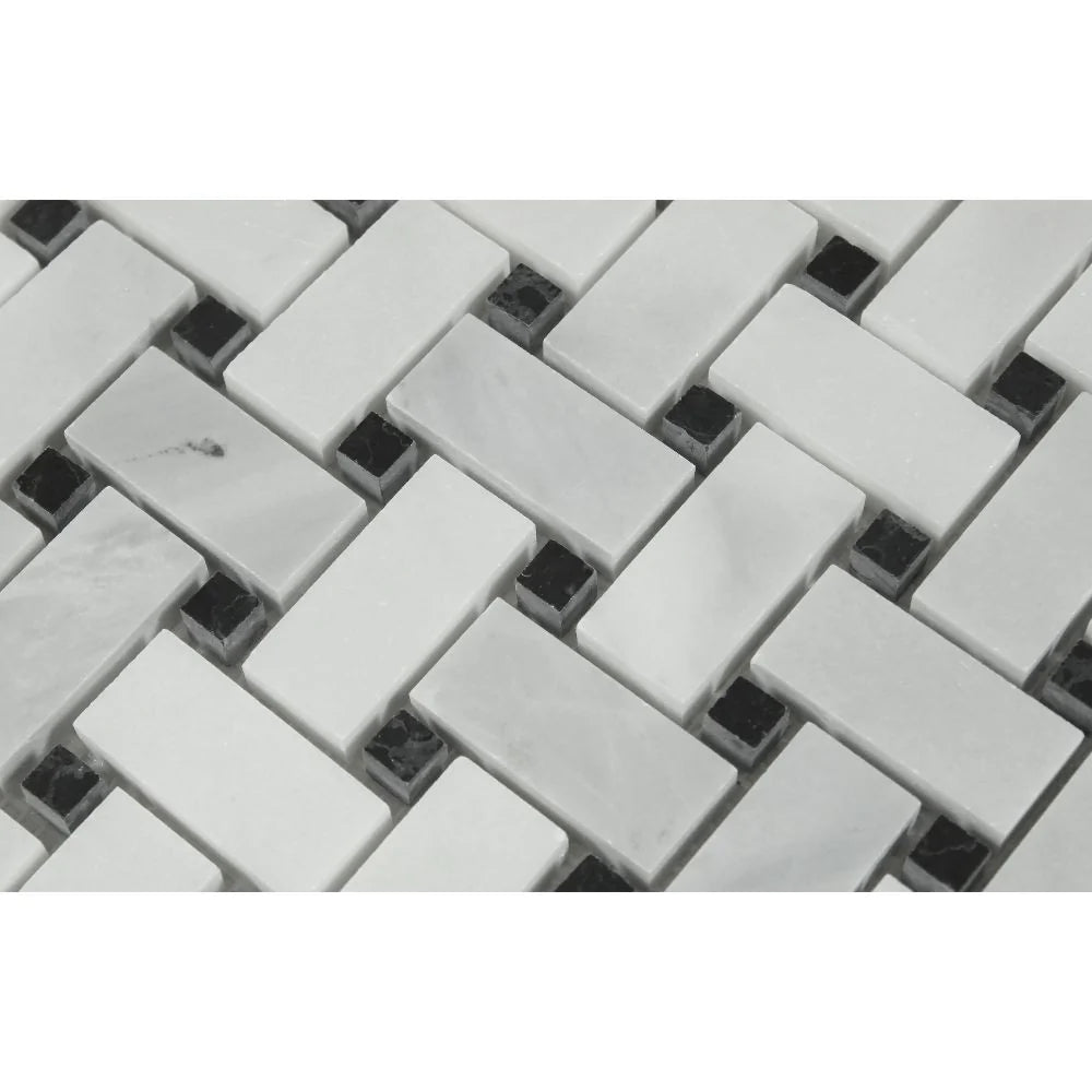 Close-up of polished Bianco Mare basketweave tile with black accents