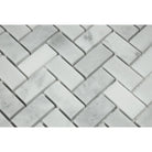 Close-up of Bianco Mare marble showing polished herringbone pattern