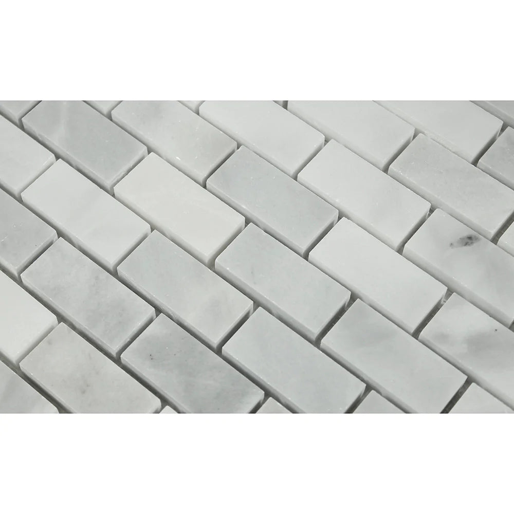  Close-up of Bianco Mare 1x2 mosaic showing polished marble surface and natural veining