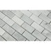  Close-up of Bianco Mare 1x2 mosaic showing polished marble surface and natural veining
