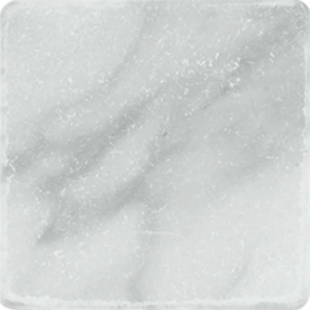 Close-up of 4x4 Bianco Mare Marble highlighting tumbled texture and matte finish