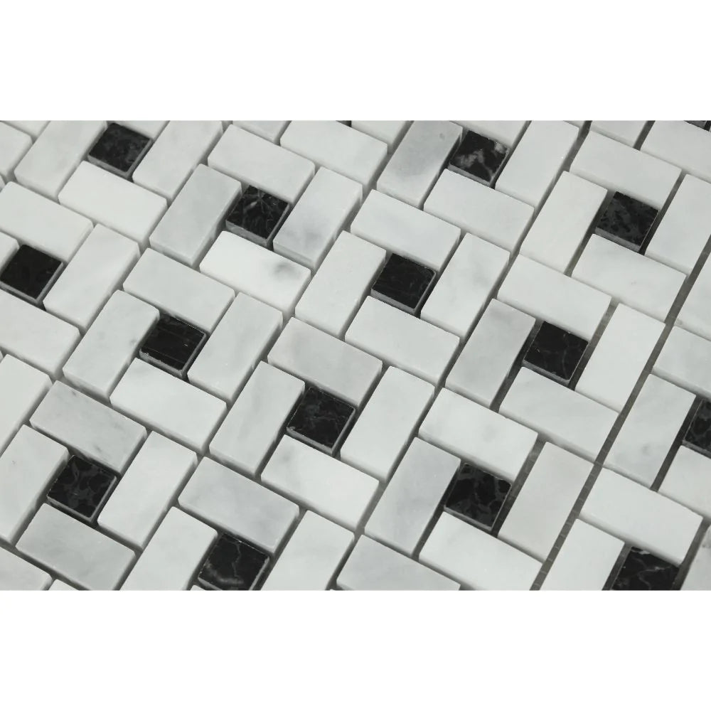 Close-up of Bianco Mare Pinwheel tile showing polished white marble and black center details