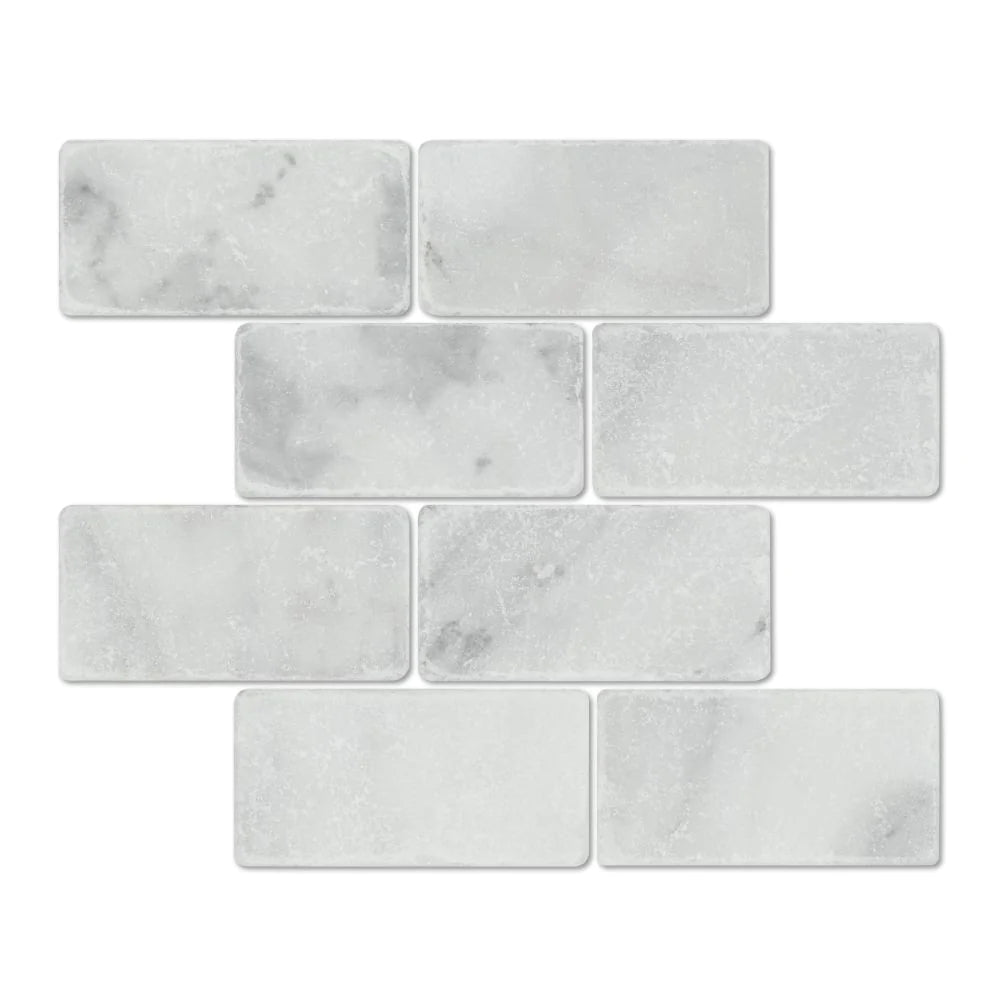 Flat view of Bianco Mare 3x6 tumbled marble tile sheet in 12x12 layout