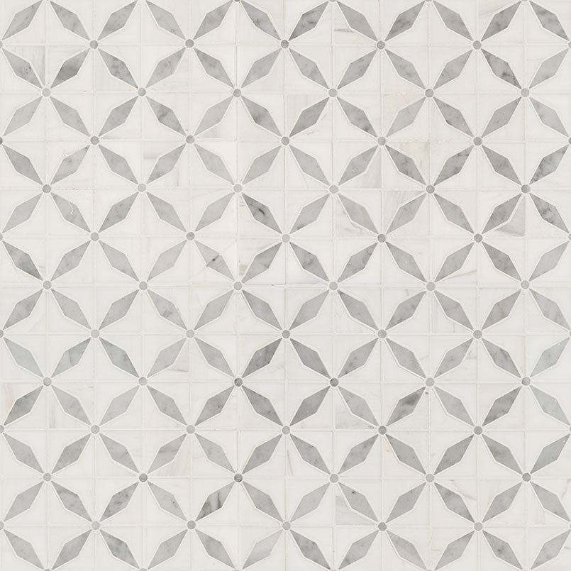 Close-up detail of Bianco Starlight mosaic showing waterjet-cut star design in polished marble