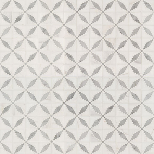 Close-up detail of Bianco Starlight mosaic showing waterjet-cut star design in polished marble