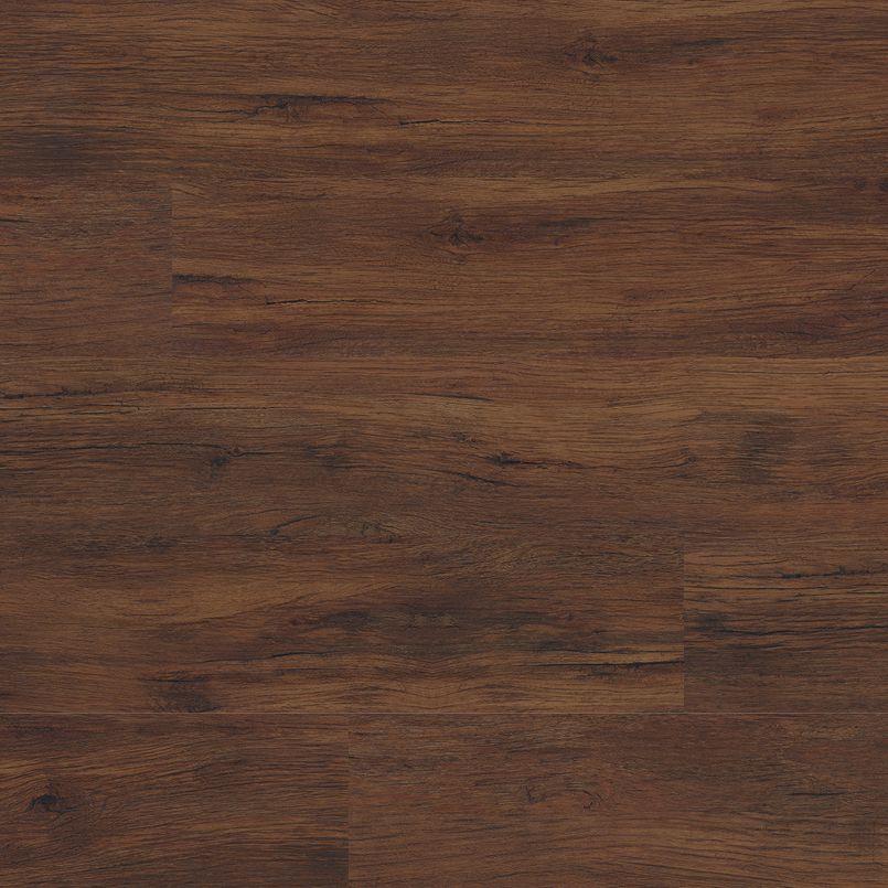 Flat lay of Braly luxury vinyl tile showing warm red-brown tones with wood knots and matte finish
