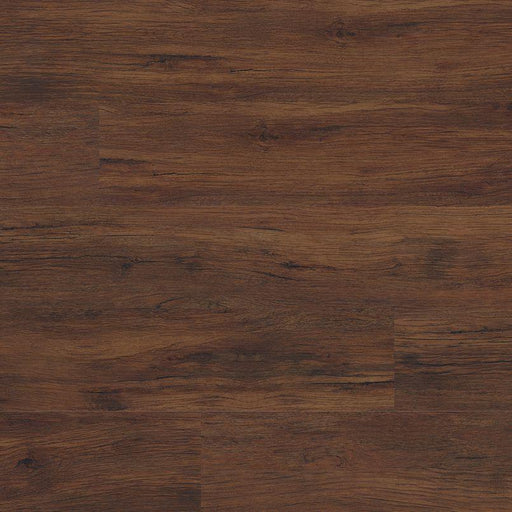 Flat lay of Braly luxury vinyl tile showing warm red-brown tones with wood knots and matte finish