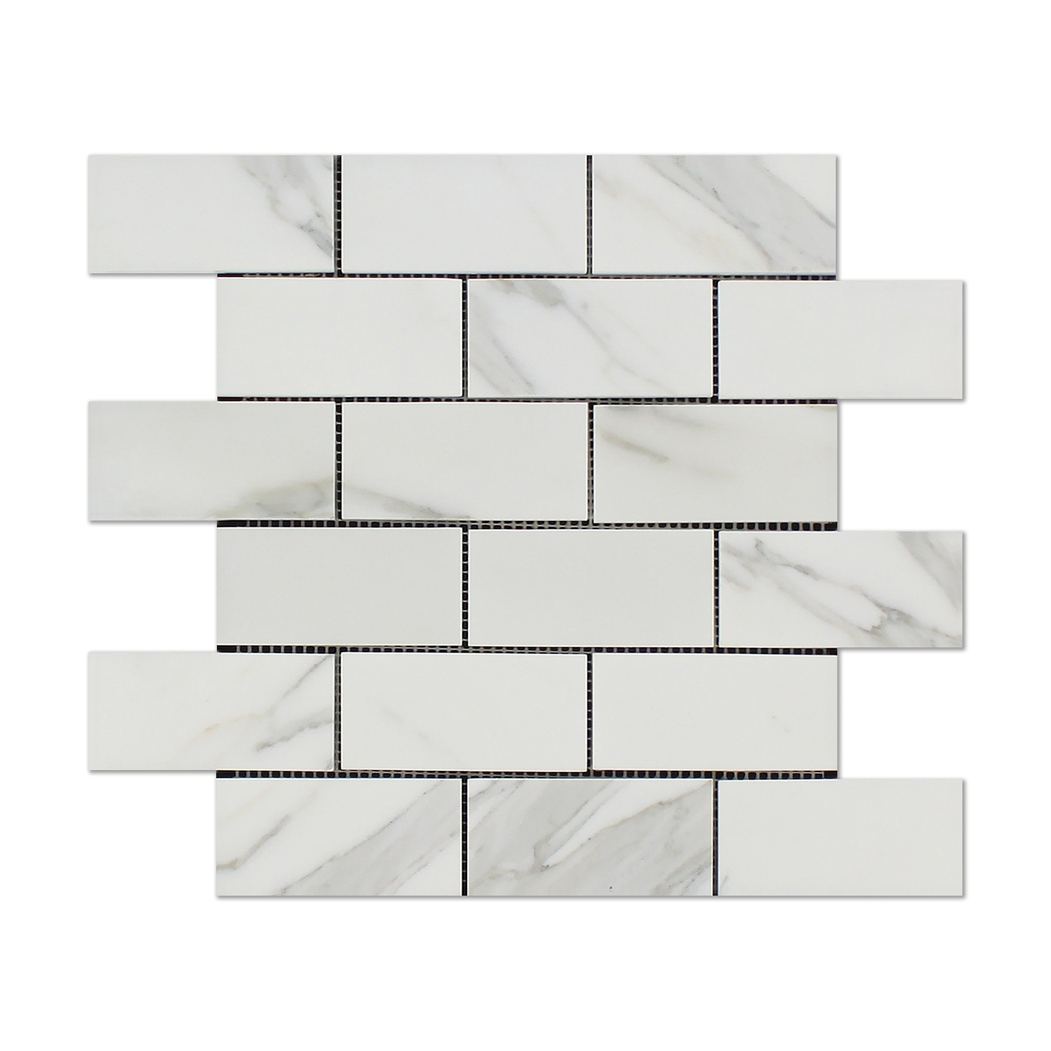 Close-up of Calacatta marble veining in 2"x4" brick layout