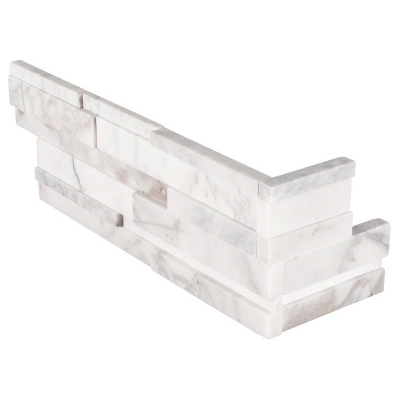 Flat lay view of Calacatta Cressa 3D corner marble panels in white with subtle gray veining