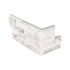 Flat lay of Calacatta Cressa 3D marble corner panel with white and gray veining