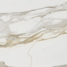Close-up of Calacatta Gold Marble surface with bold golden veining