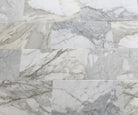 Calacatta Gold 12x24 marble tiles installed on bathroom or kitchen wall
