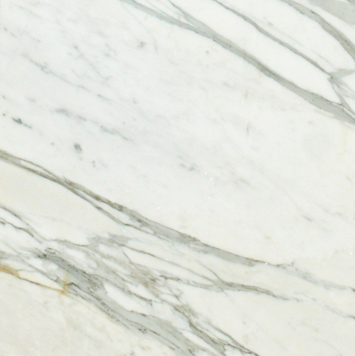 Close-up of Calacatta Gold Marble showing rich gold veining on white background