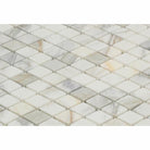 Close-up of diamond pattern showing Calacatta Gold veining and shine