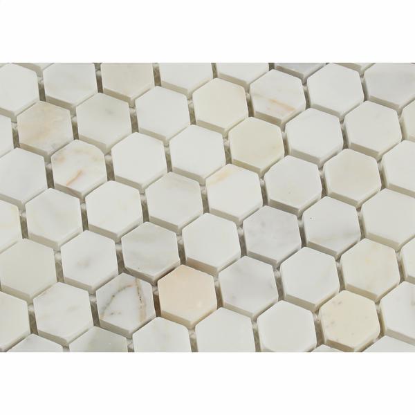 Close-up of 1" hexagon tile showing gold veining and polished surface