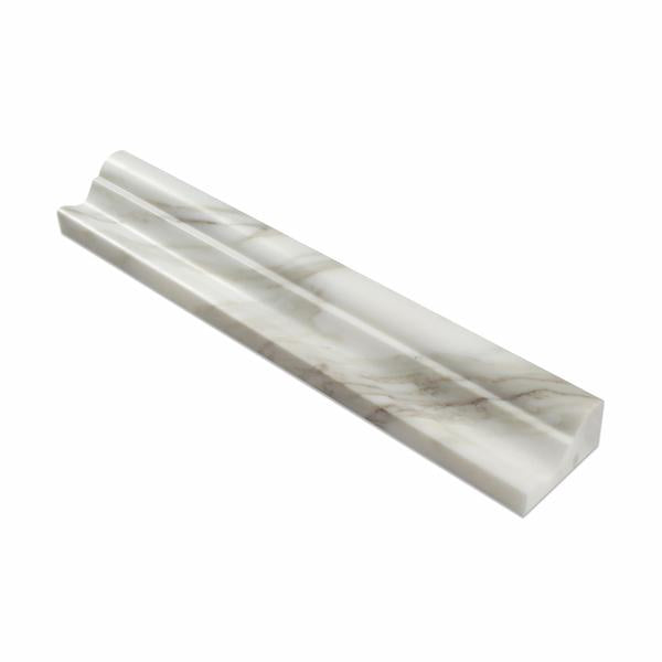 Close-up of veining detail and edge profile on Calacatta Gold crown molding