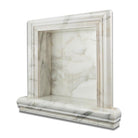Close-up of veining detail on Calacatta Gold marble niche edge